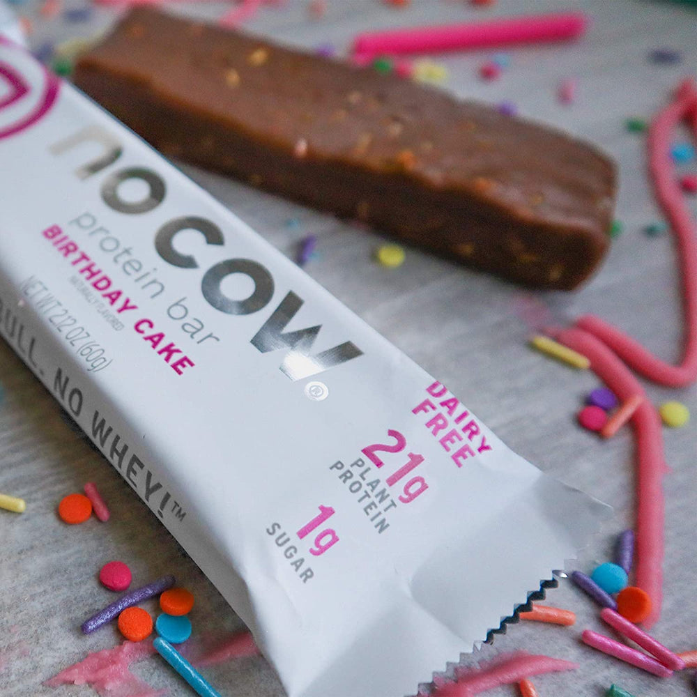 No Cow Birthday Cake bar vegan ingredients and gluten-free appeal for inclusive snacking.