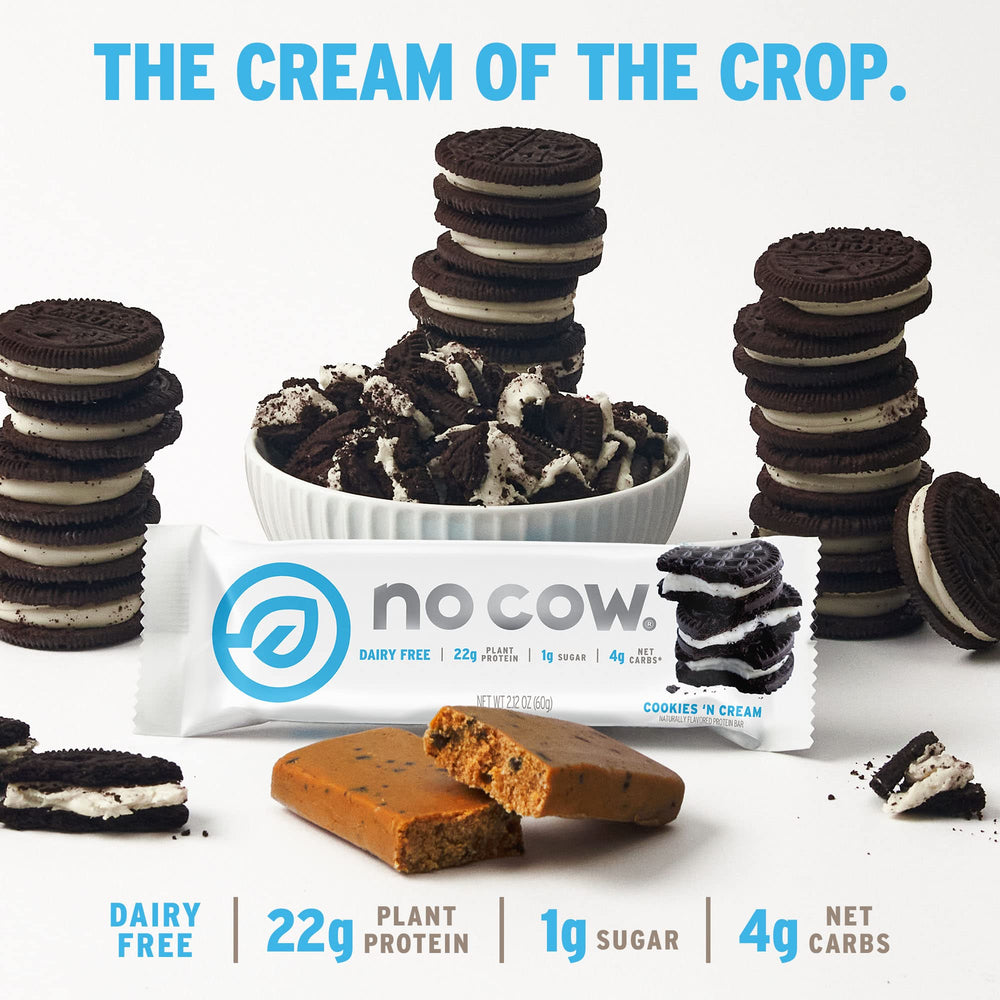No Cow Cookies 'n Cream bar close-up showing crunchy pieces and creamy filling.