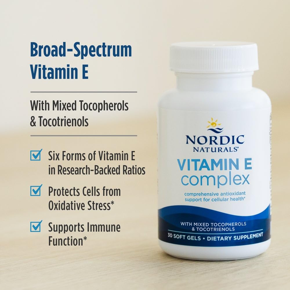 Soft gels in hand from Nordic Naturals Vitamin E Complex.
