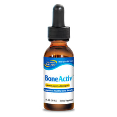 North American Herb & Spice Boneactiv rubbing oil bottle pour for easy topical use.