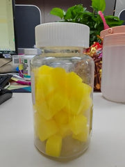 Novure gummies in hand illustrating portable daily serving
