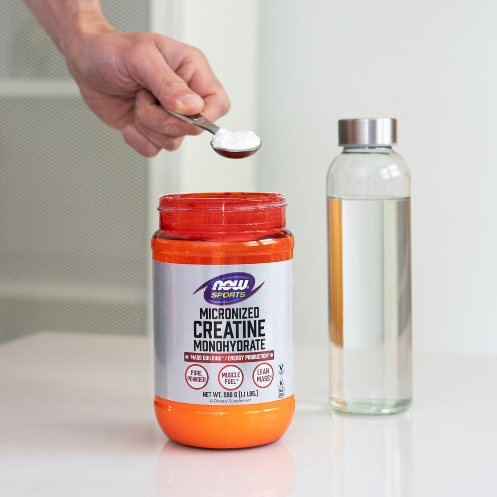 NOW Foods Creatine Powder ready for workouts in a convenient kitchen container.