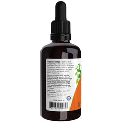 Close-up of NOW Foods Green Black Walnut Wormwood liquid dosing