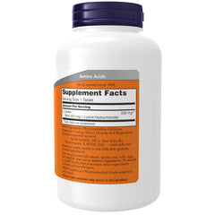 NOW Foods L-Lysine 500 mg tablets label close-up emphasizing essential amino acid for protein synthesis.