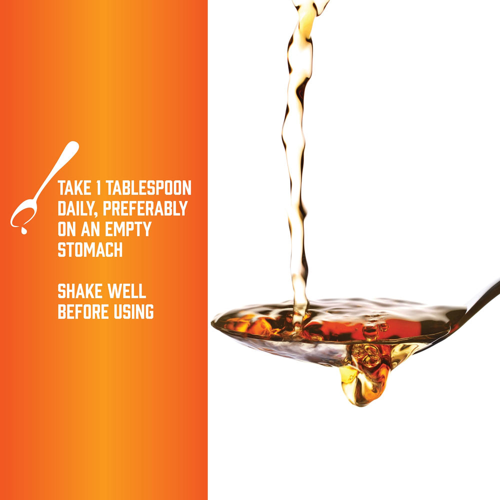 Close-up of clear NOW L-Carnitine Liquid highlighting purity and clarity.