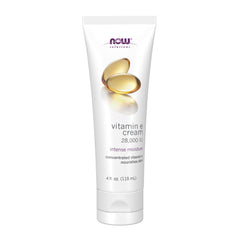 NOW Foods Vitamin E Cream bottle close-up showing 28,000 IU hydration for face and body.