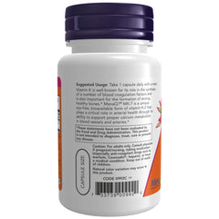 NOW Foods Vitamin K-2 MK7 capsules closeup, vegan capsules for bone support.