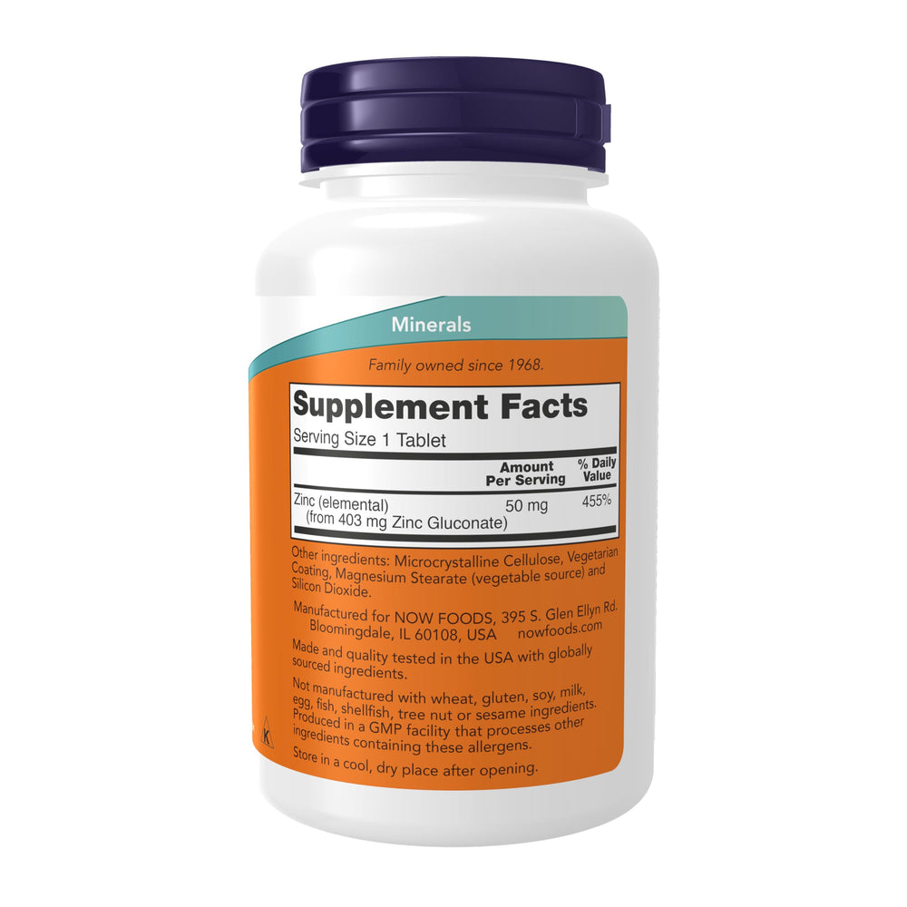 NOW Foods Zinc Gluconato 50 mg, etiqueta visible, ideal para controlar la ingesta diaria.