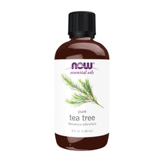 NOW Foods Tea Tree Oil bottle close-up highlighting purity for diffusion.