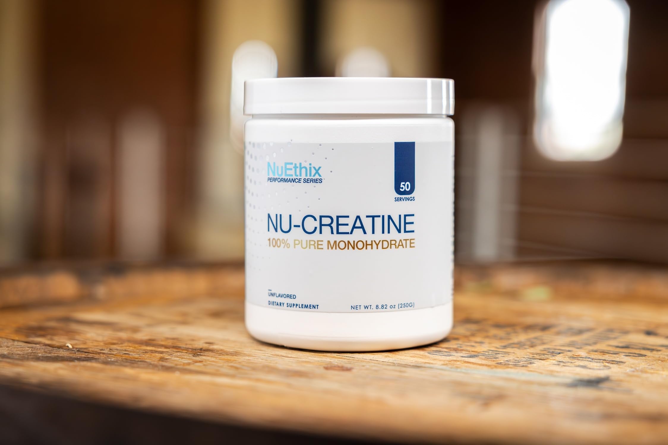 NuEthix Nu-Creatine Pure Monohydrate front design suggests cognitive support for training.