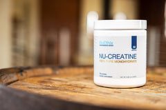 NuEthix Nu-Creatine Pure Monohydrate powder dispense captures fine texture for easy mixing.