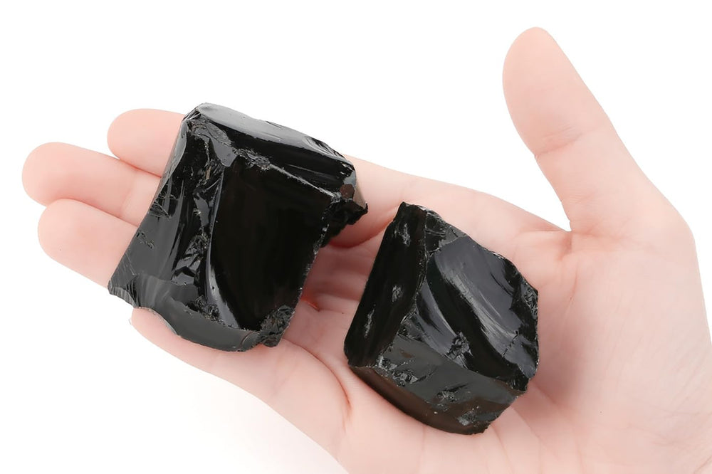 Close-up of NUKAYAI obsidian rough texture showing natural surface variations.