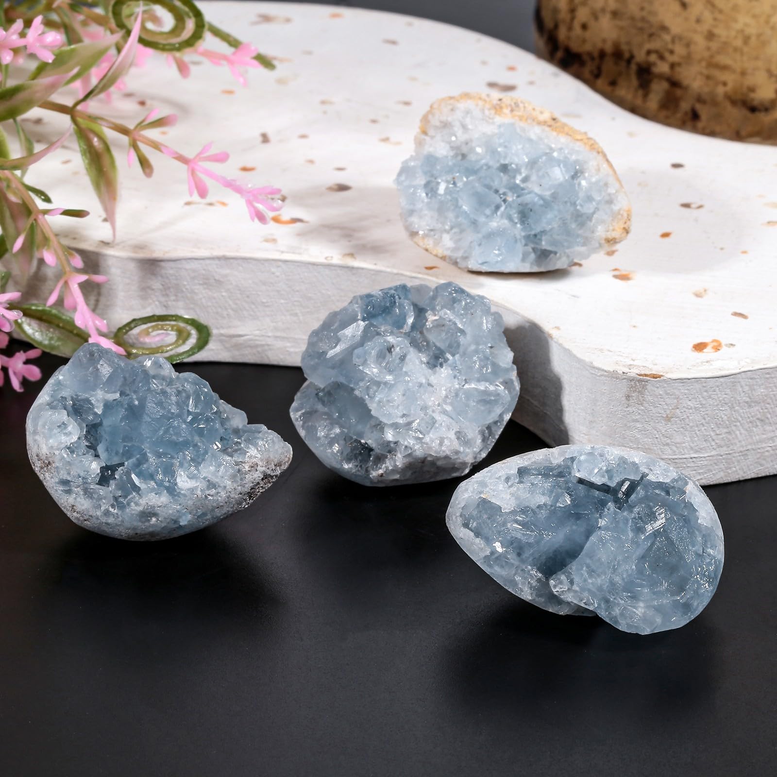 Nupuyai blue Celestite cluster shows size variety, ideal for desk paperweights or shelf displays.