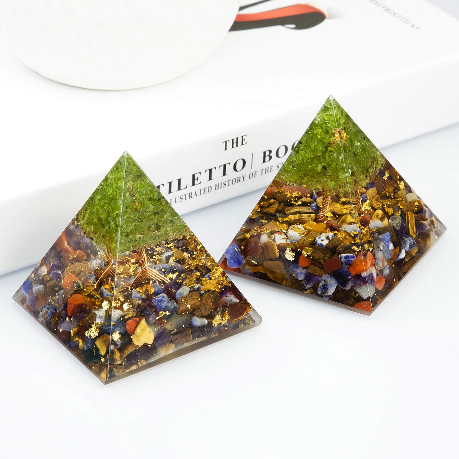 Nupuyai Orgone Pyramid made of resin and chip stones, suitable for energy balance and desk decor.