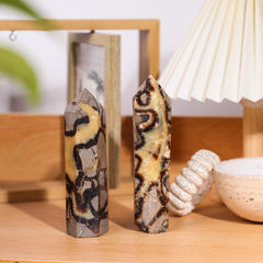 Nupuyai Septarium handheld palm-size wand for calming practice.