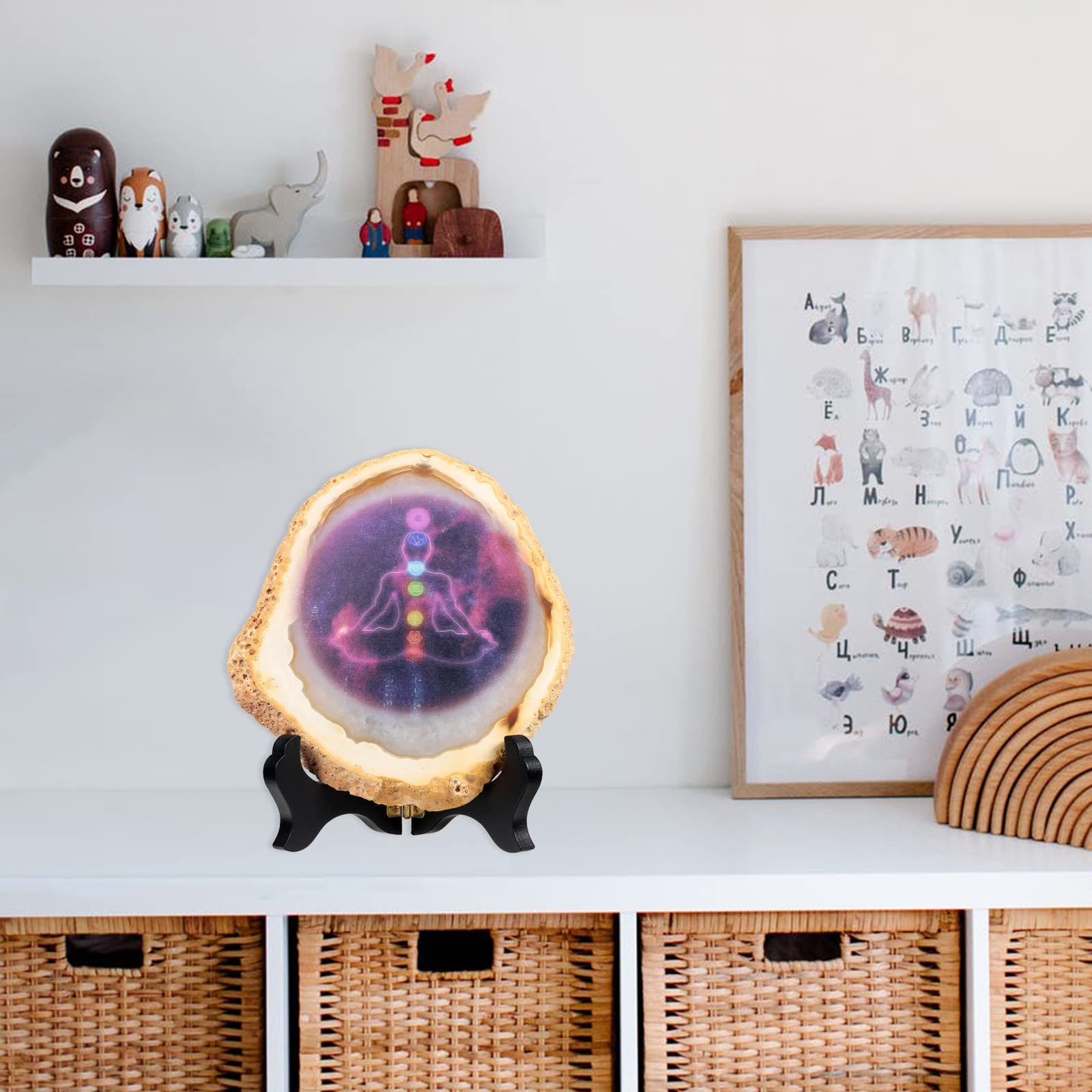 Nupuyai yoga meditation display features chakra diagram on polished stone