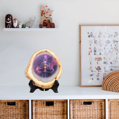 Nupuyai yoga meditation display features chakra diagram on polished stone