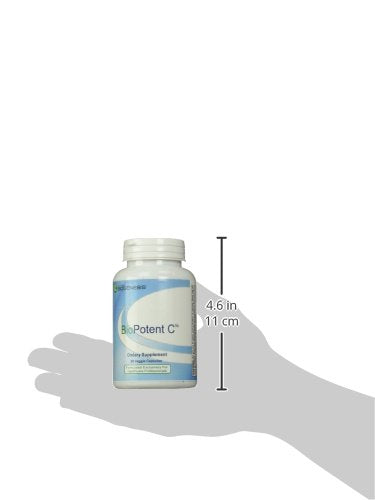 Capsules in hand suggesting convenient vegan Vitamin C supplementation