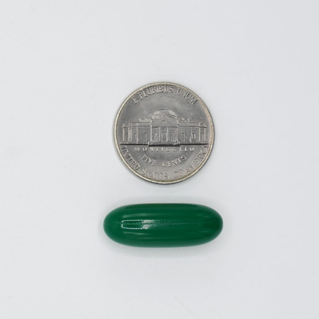 Nutra Nutrition Gotu Kola capsules beside a glass of water for easy ingestion.
