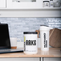 NutraBio Arginine AKG bottle on shelf conveys reliability and US-made manufacturing.