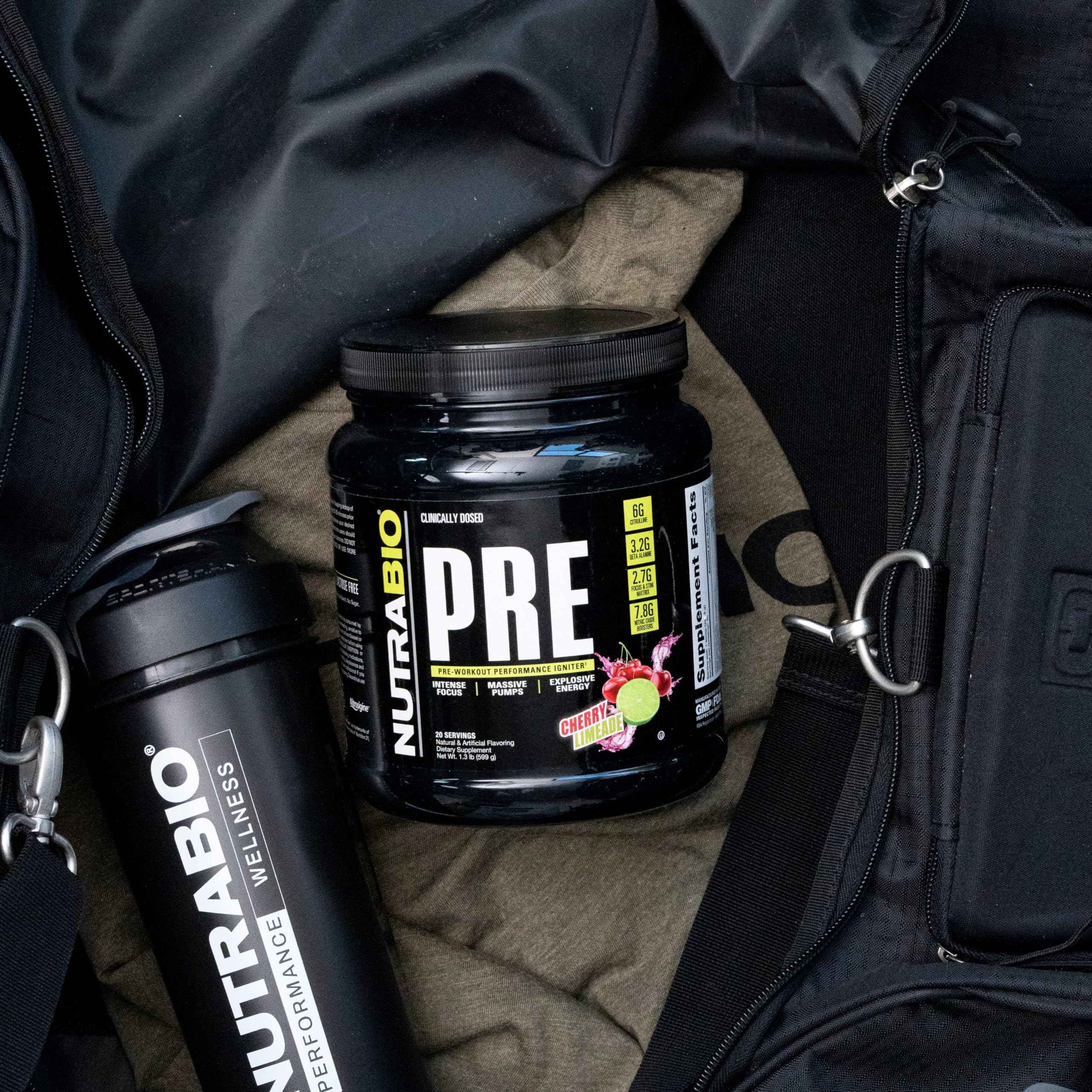 NutraBio PRE Workout old formula glass shows cherry limeade hydration during sessions.