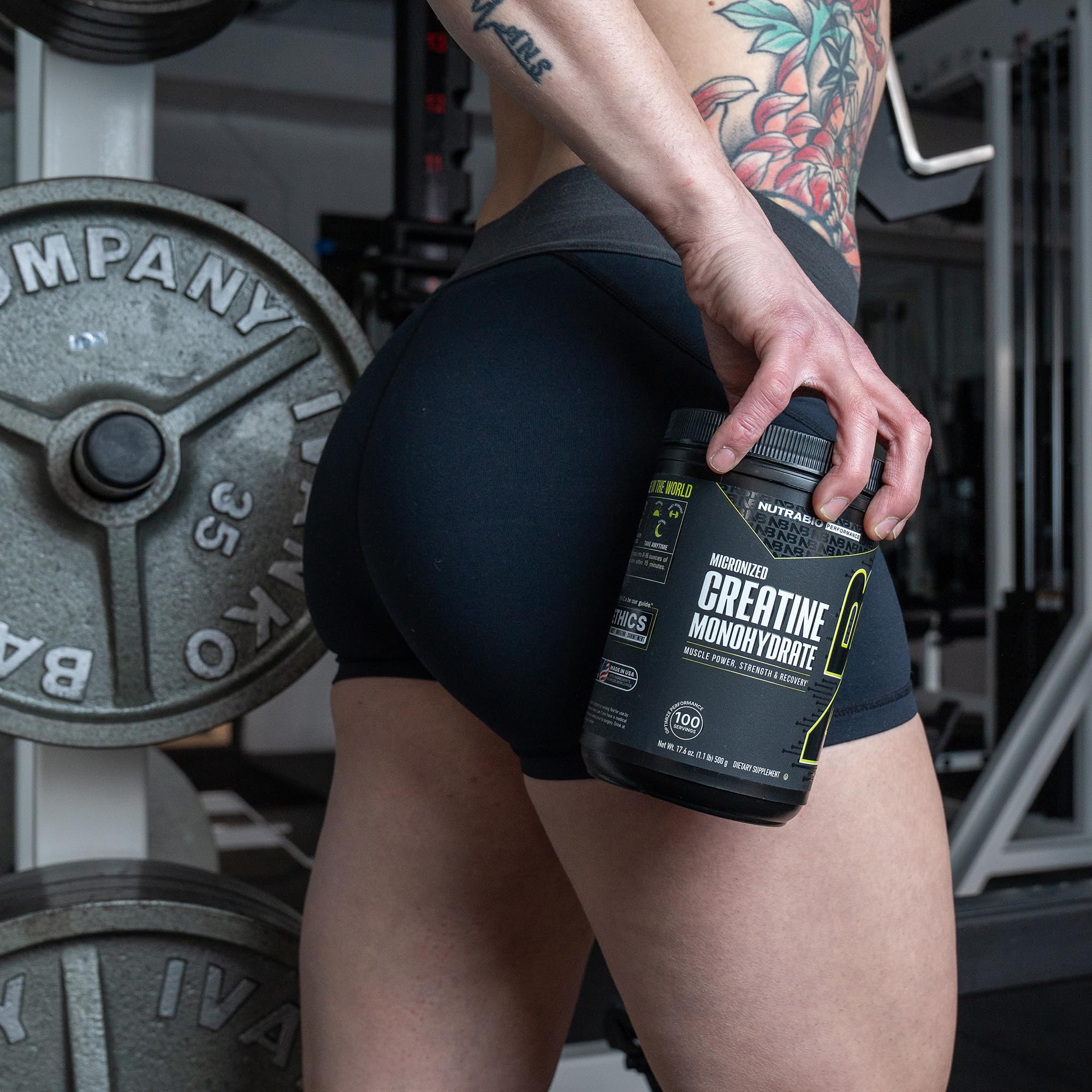 Micronized NutraBio Creatine Monohydrate powder in a glass bowl