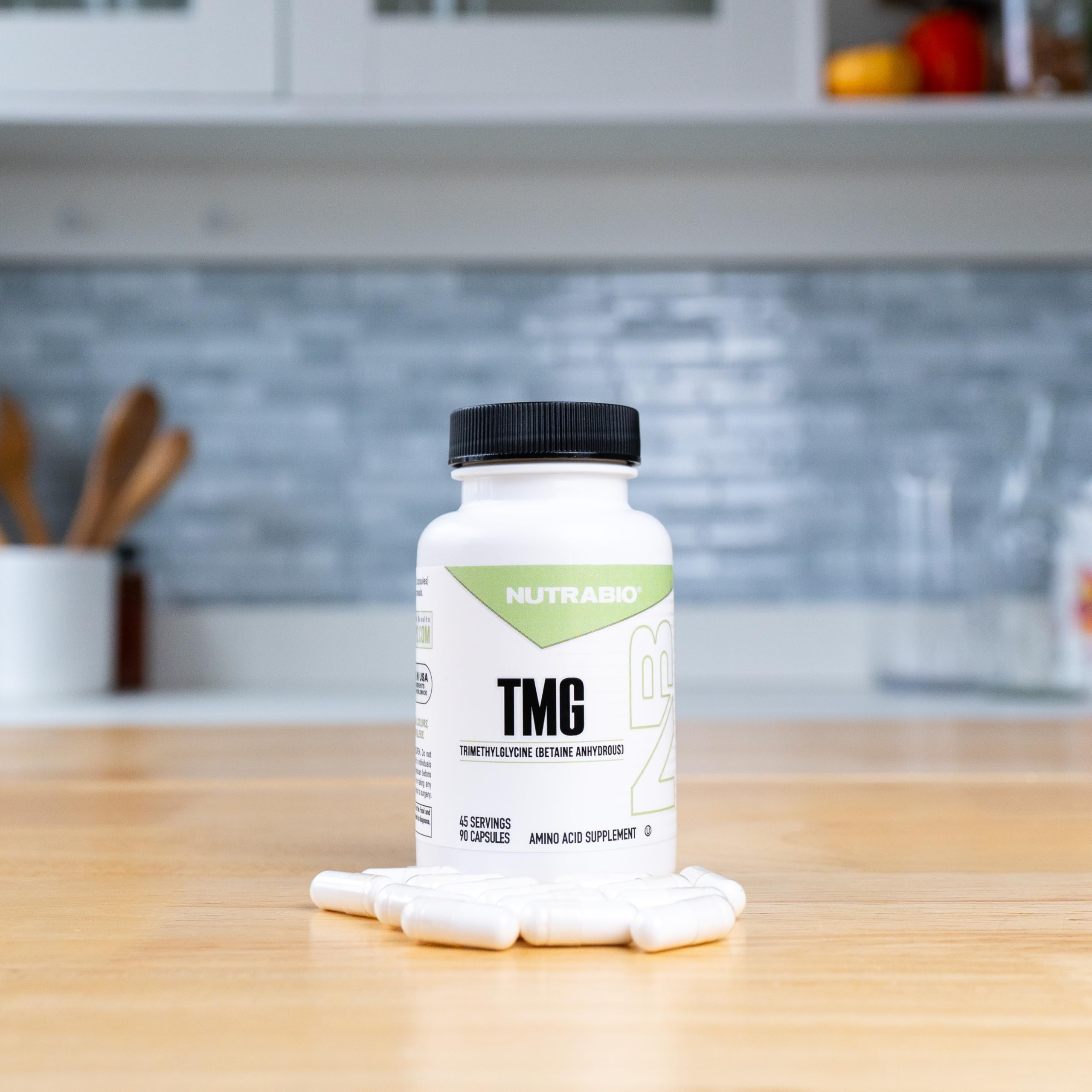 NutraBio TMG capsules closeup, convenient daily dose.