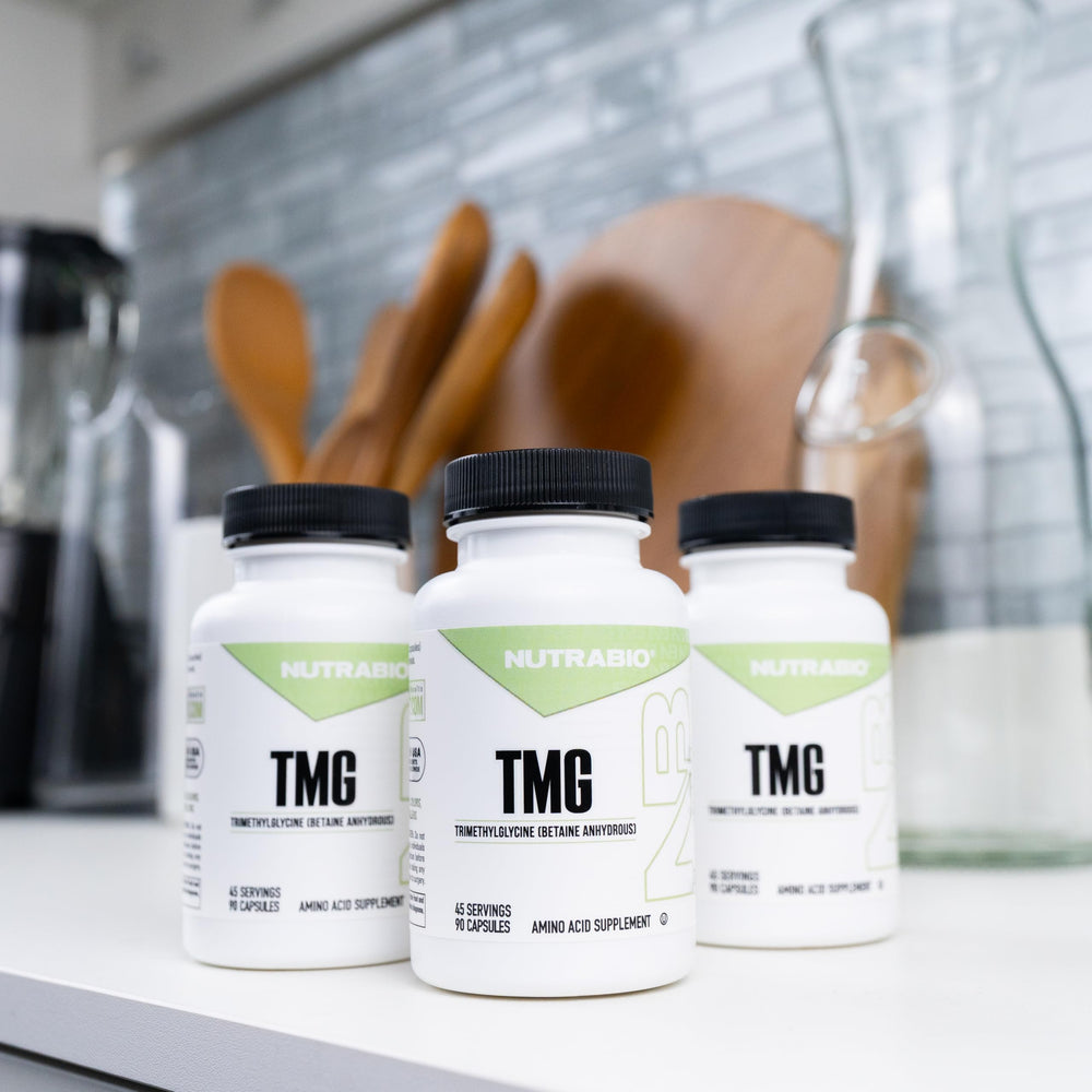 NutraBio TMG capsules arranged for easy dosing.