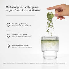 NutraChamps Super Greens powder poured into a glass for a vibrant green drink.