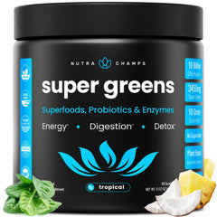 NutraChamps Super Greens tub tropical on kitchen counter for quick daily greens boost.