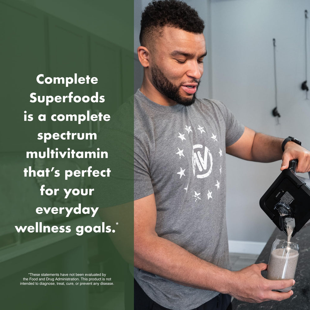 NutraOne complete mix shown with a glass of shake to illustrate on-the-go wellness.