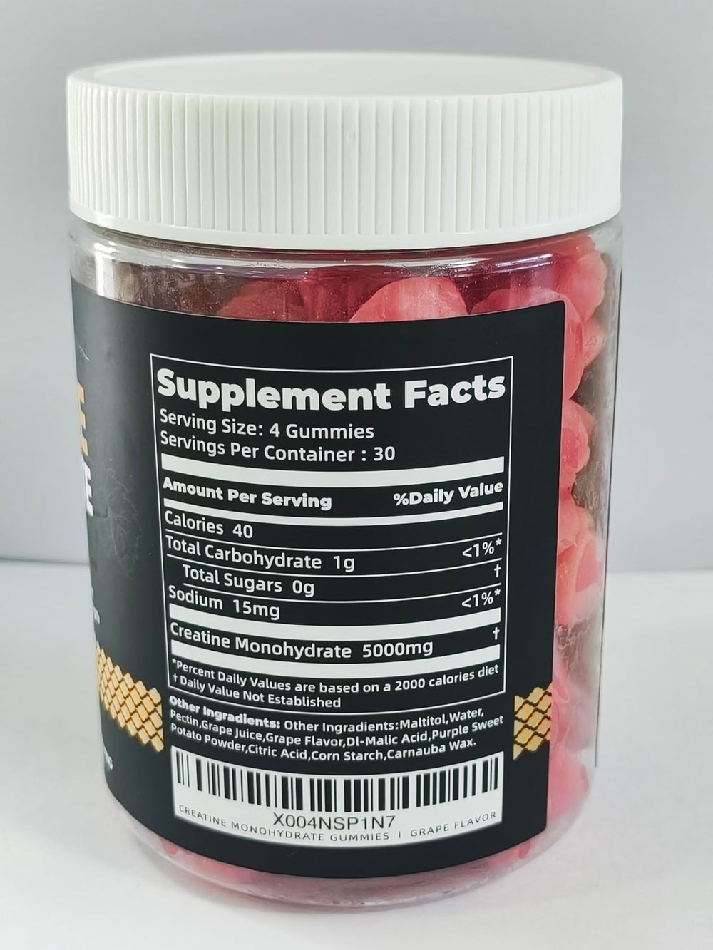 Closeup of Nutravita Creatine Gummies highlights grape flavor for tasty supplementation.