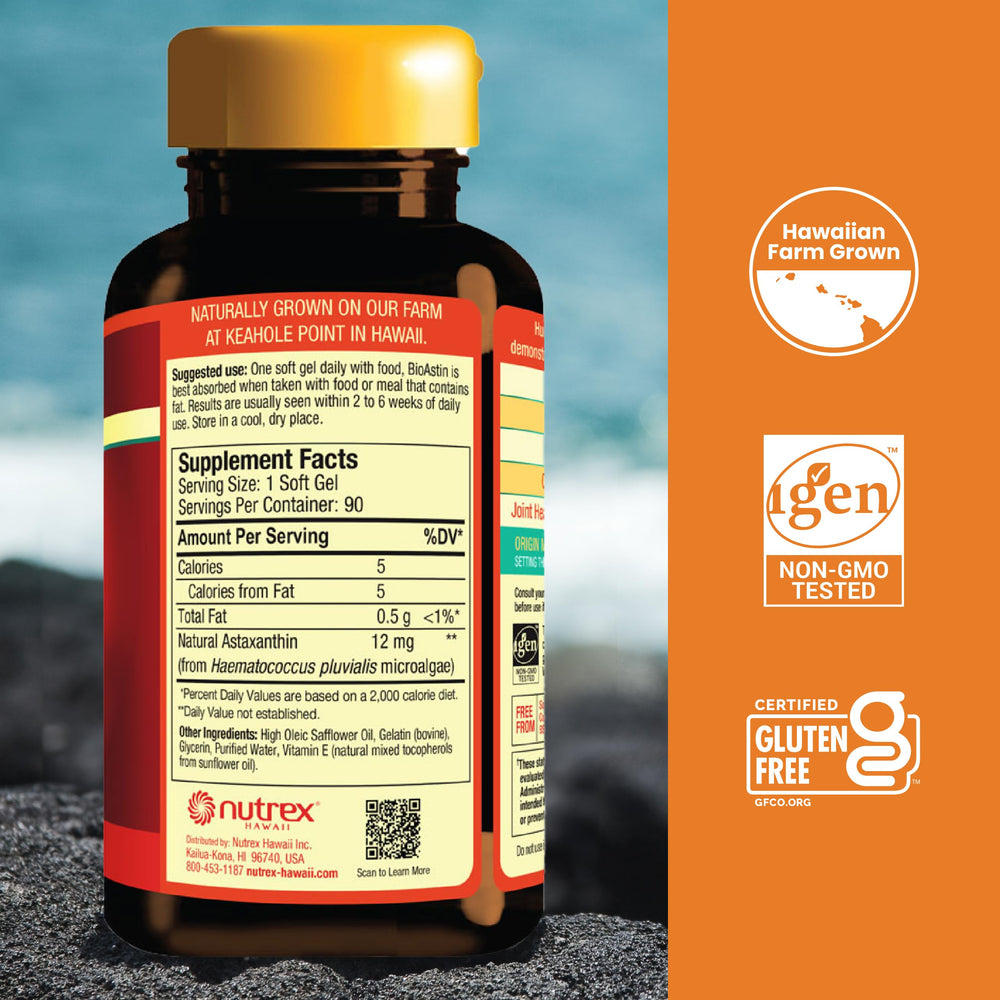 BioAstin softgels closeup showing vibrant orange capsules