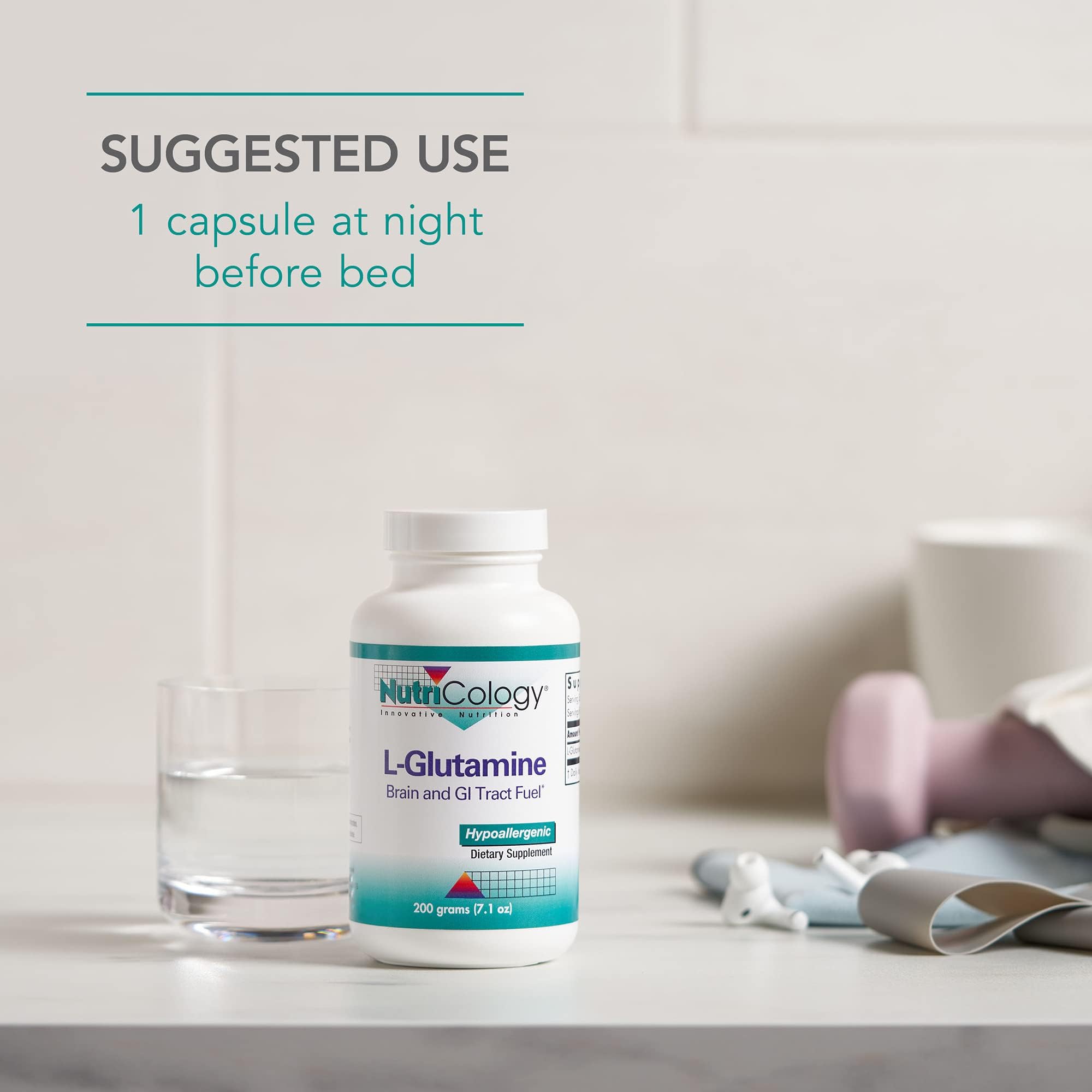Nutricology L-Glutamine bottle beside glass with water, easy mix.