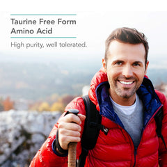 Nutricology Taurine capsules spill from bottle, convenient daily energy support.