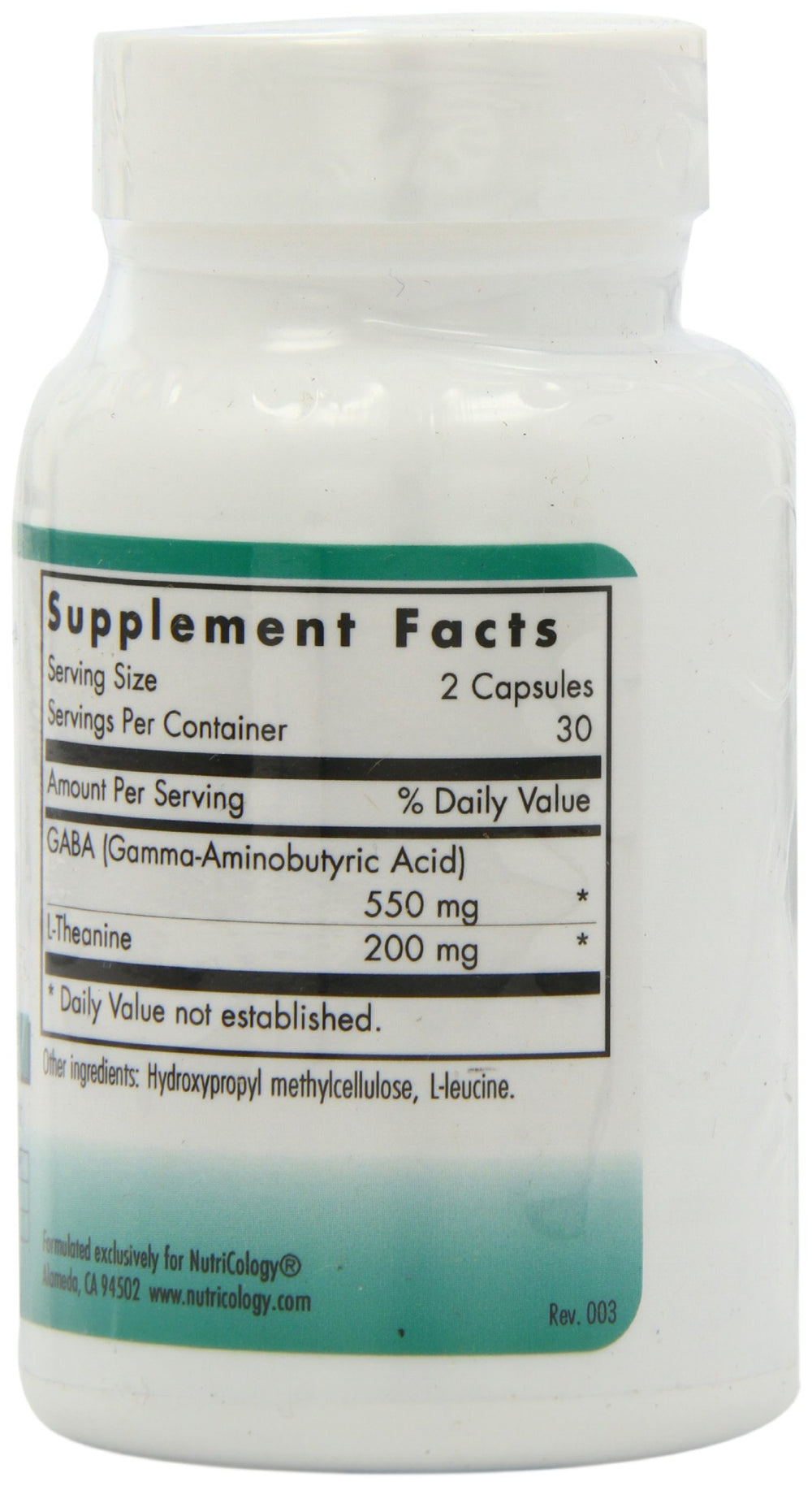 Nutricology ZenMind capsules close-up shows vegetarian formula for gentle calm.