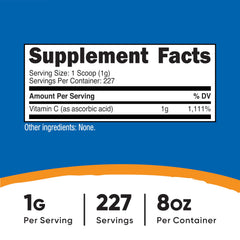 Nutricost vitamin C powder scoop for precise 1 g servings.