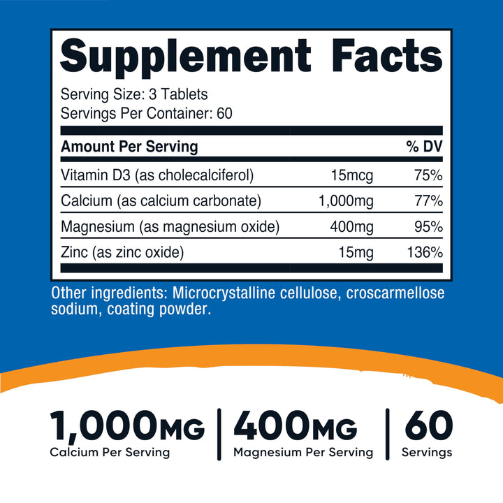 Nutricost Calcium Magnesium Zinc tablets close-up highlighting compact daily dosage.