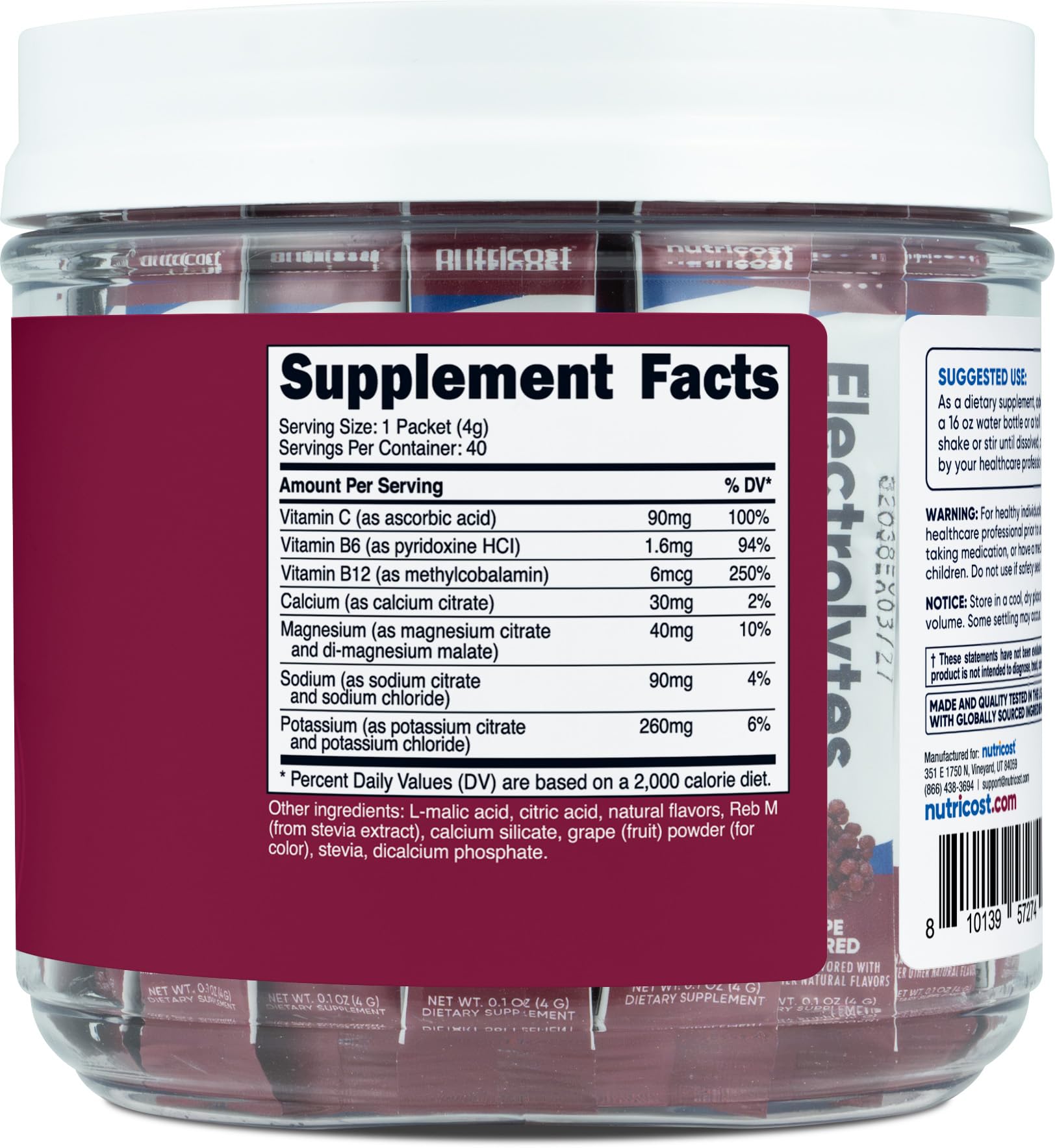 Nutricost Electrolytes Complex grape powder dissolving quickly in water.