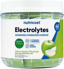 Nutricost Electrolytes Green Apple stickpack on counter for on-the-go hydration.