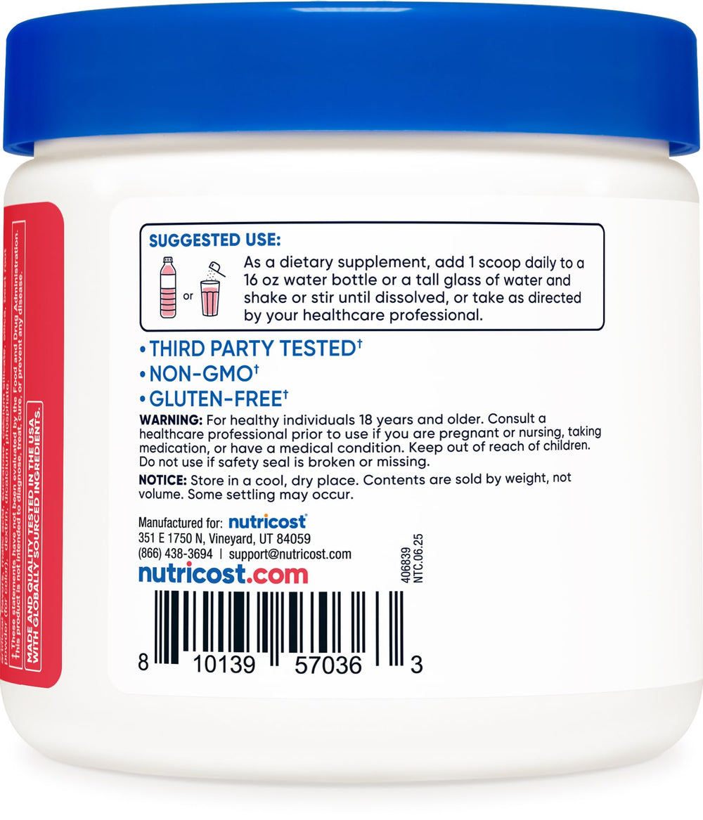 Nutricost Energy Complex glass with powder dissolving into a refreshing drink.