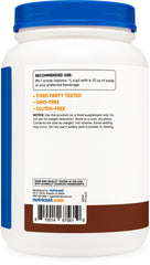 Nutricost Grass-Fed Whey Protein Isolate chocolate shake glass showing rich flavor and texture