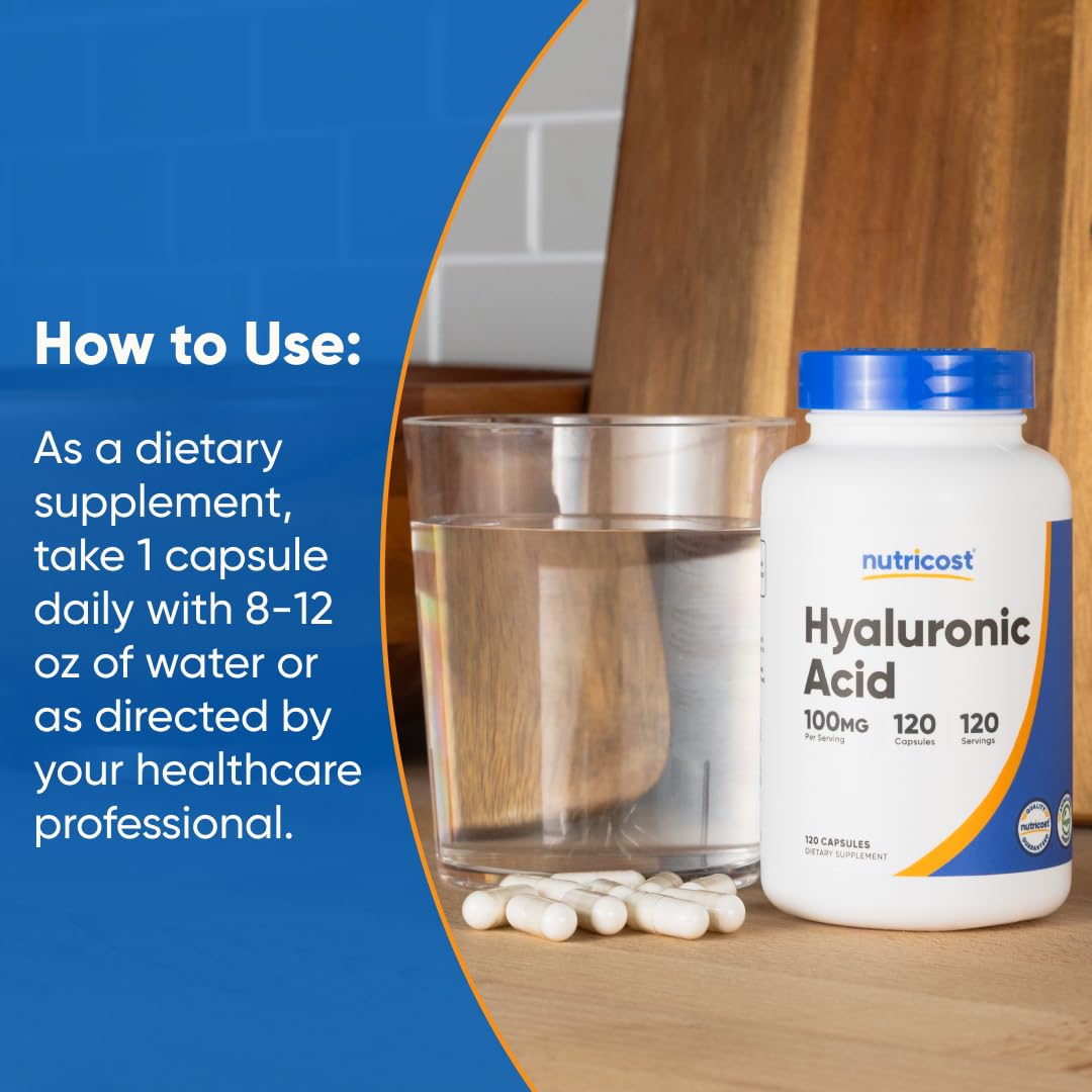 Capsules resting beside a glass of water for easy swallowing.