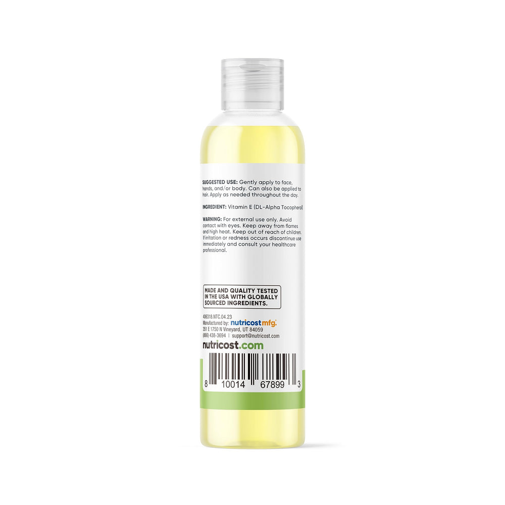 Nutricost Vitamin E Oil packaging closeup highlighting quality standards.