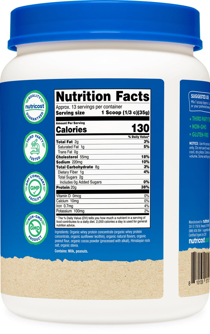 Scoop of Nutricost whey protein concentrate beside a measuring spoon