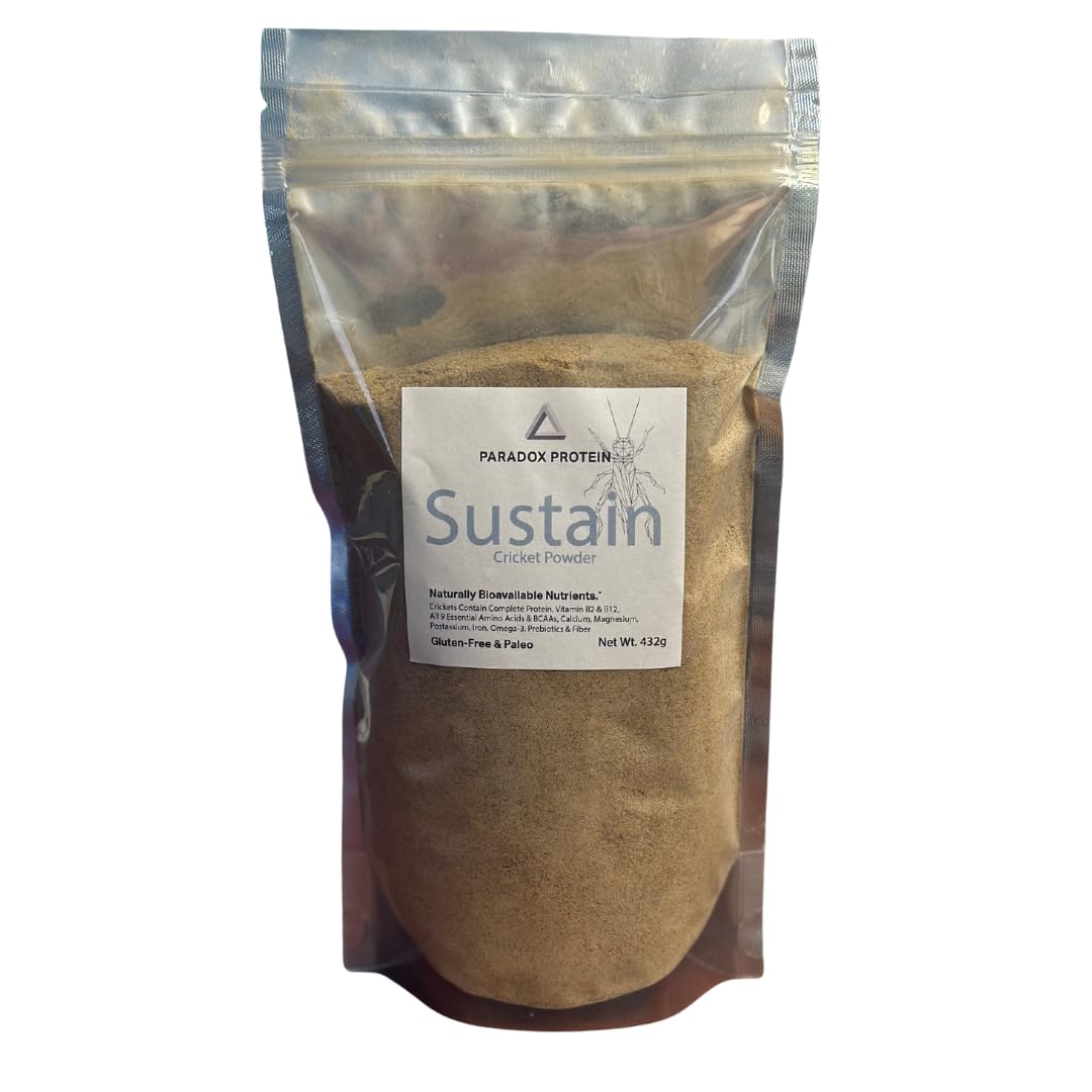 NutriCricket Paradox Protein powder scoop ready for convenient smoothies and baking.