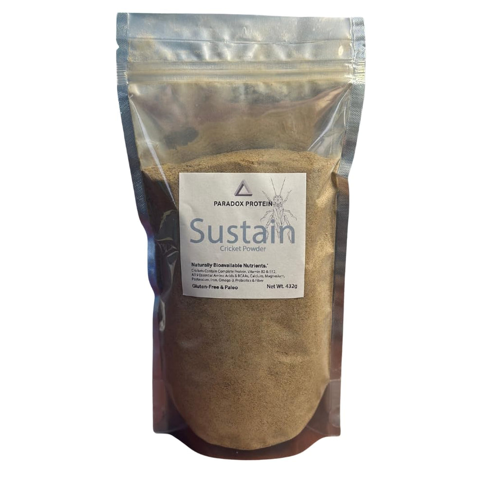 NutriCricket Paradox Protein powder scoop ready for convenient smoothies and baking.