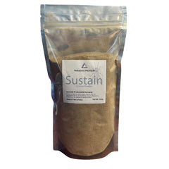NutriCricket Paradox Protein powder scoop ready for convenient smoothies and baking.