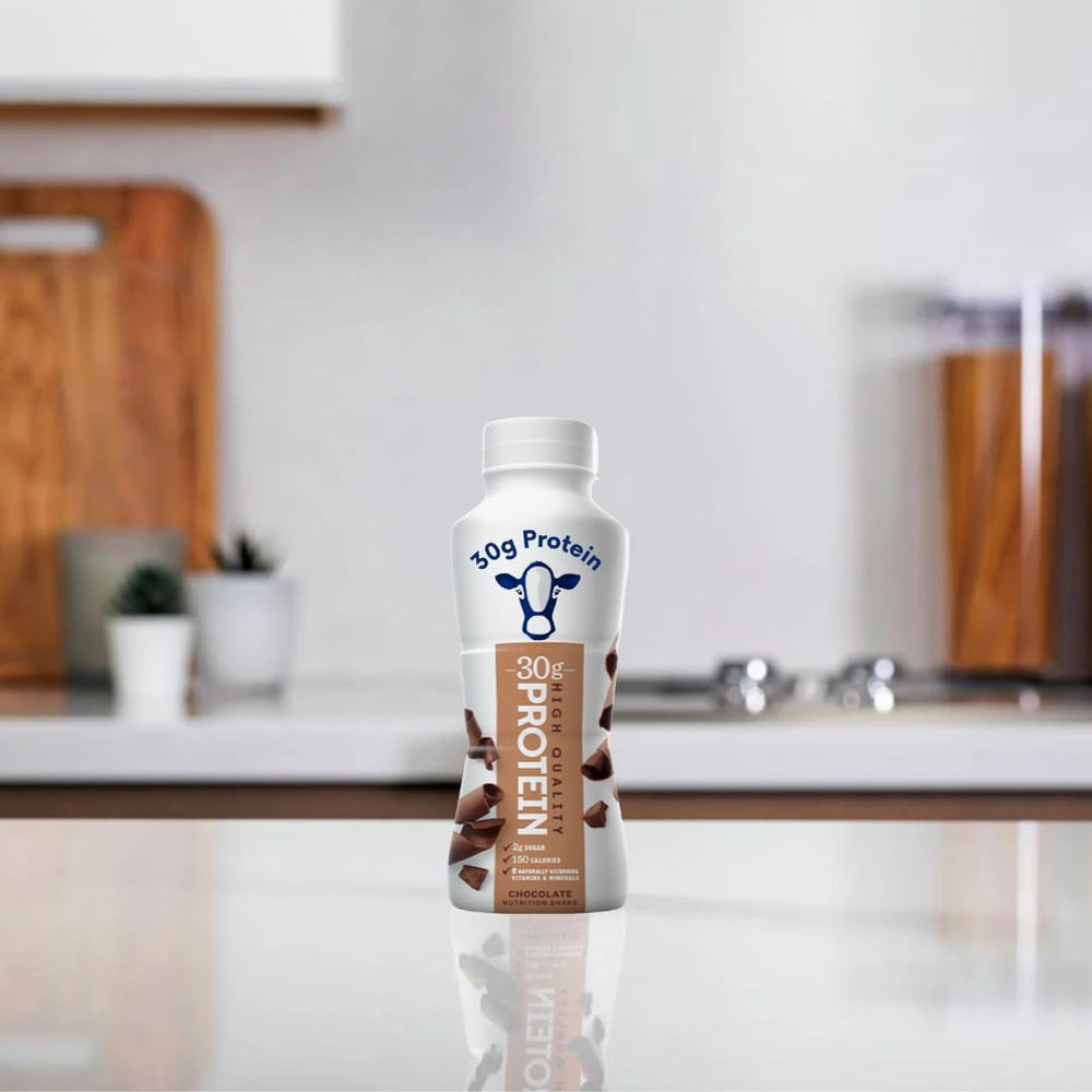 Nutrition-Plan shake being poured, showcasing smooth milk chocolate flavor