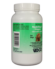 Dog enjoys NutriVed ZinPro chewable tablets during mealtime for daily dosing.